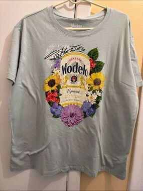 ModelCo light turquoise floral logo tee